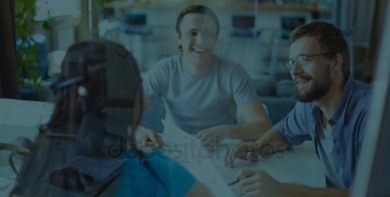 three professional educators at a meeting